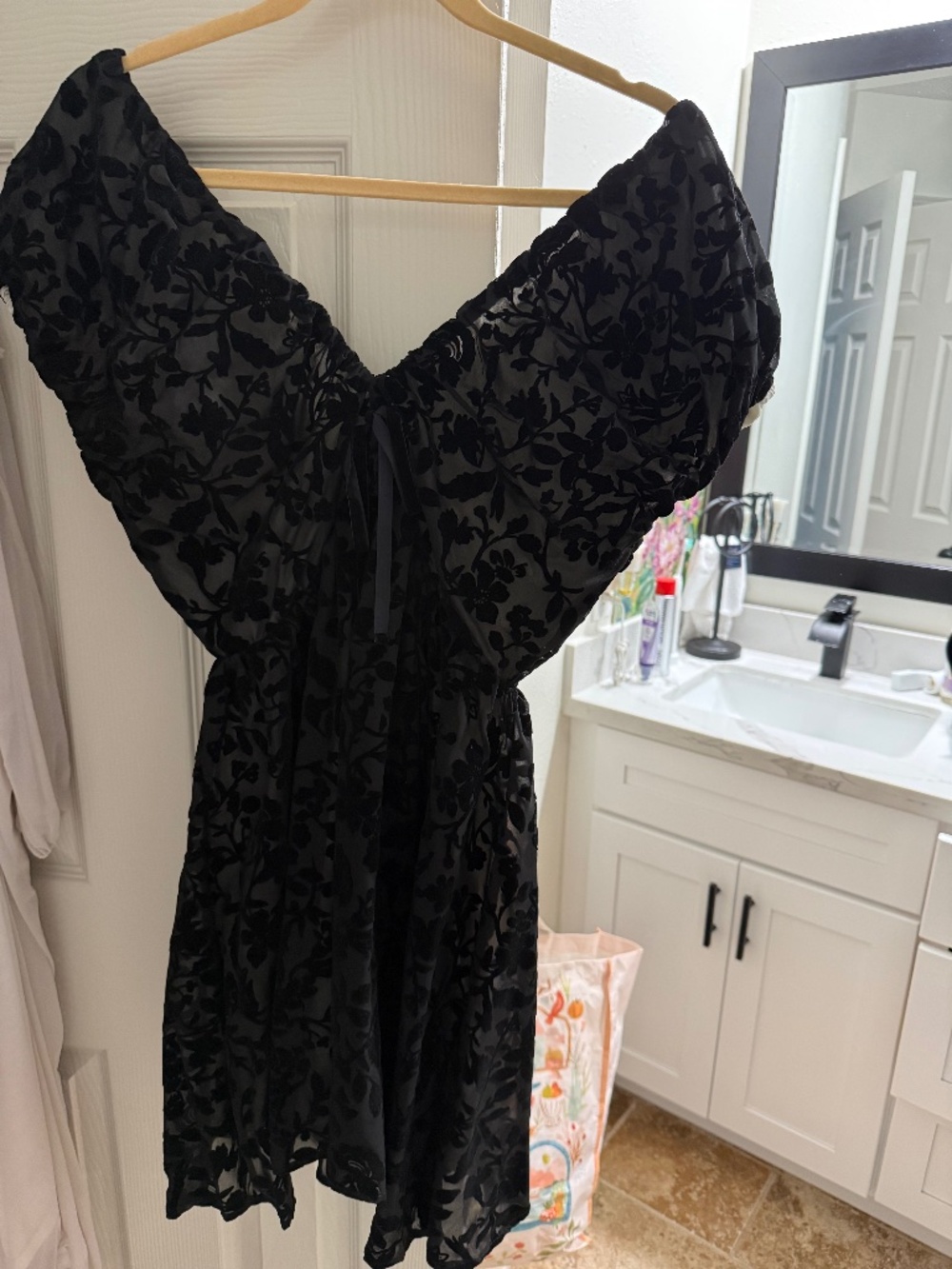 Off the shoulder black lace mini dress